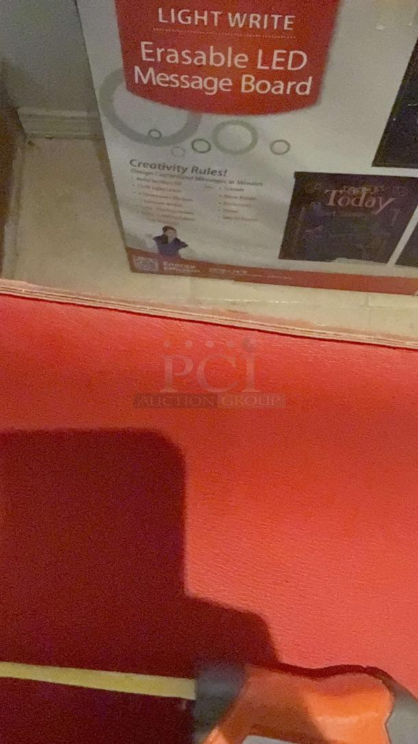 Red bar stool with adjustable 29" height and swivel feature, small tear noted, ideal for cafes or breakrooms.