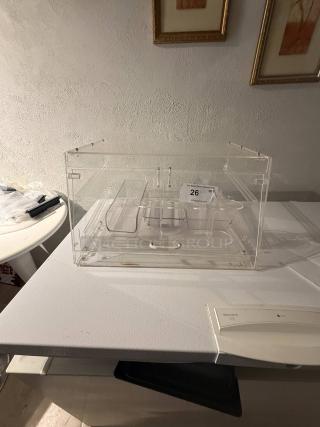 Clear acrylic countertop display case, 21" wide, with removable dividers for customizable organization. Ideal for retail use.