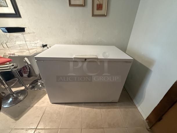 Kenmore 48" chest freezer, model 253.91935312, in excellent condition with wire basket and locking mechanism.