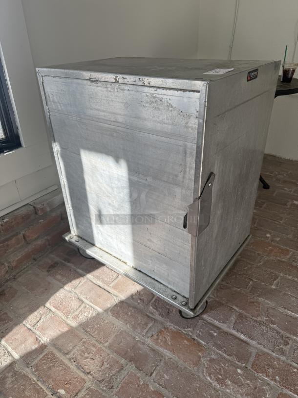 Lockwood commercial half-size mobile pan rack/proofing cabinet, sturdy metal, used condition, for food storage and transport.