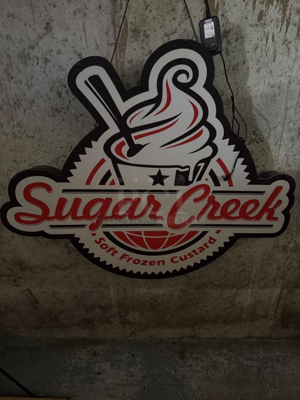 Sugar Creek Soft Frozen Custard LED sign, red and white graphic with logo, designed to hang and plug in, vibrant decor.