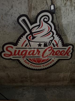 Sugar Creek Soft Frozen Custard LED sign, red and white graphic with logo, designed to hang and plug in, vibrant decor.