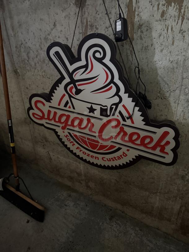 Sugar Creek Soft Frozen Custard LED sign, features red, white, black graphics. Ready to hang, plug in. Perfect for decor.