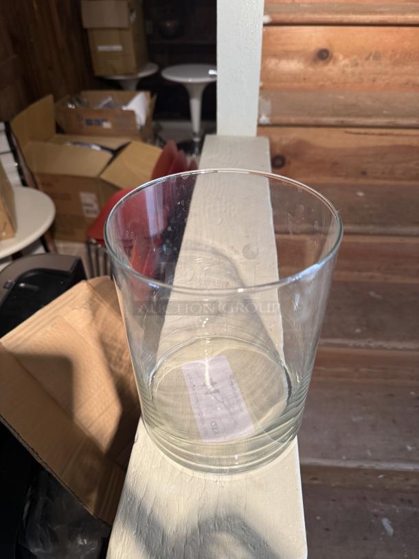 Clear glass cylinder vase, large size, classic straight-sided design. Versatile for decor use. New condition, no visible defects.