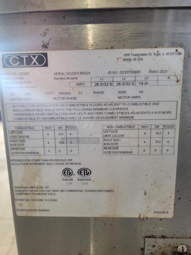 Middleby Marshall CTX DZ33T label showing serial number and electrical specs. Likely on a high-speed infrared conveyor oven, year 2023.