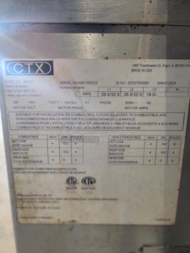 Middleby Marshall CTX DZ33T label with specifications. Manufactured in 2023. Details include voltage, amps, and clearance info.
