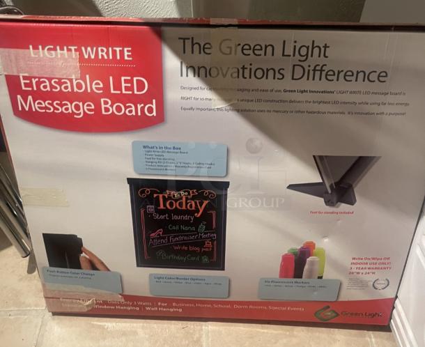 Green Light Innovations LIGHT WRITE LED message board, 20"x24", erasable, includes markers, stand, and hanging kit, new condition.
