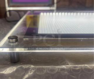 LED Light Up Erasable Message Board with edge-lit backlighting, sleek acrylic design, standoff mounting hardware visible.