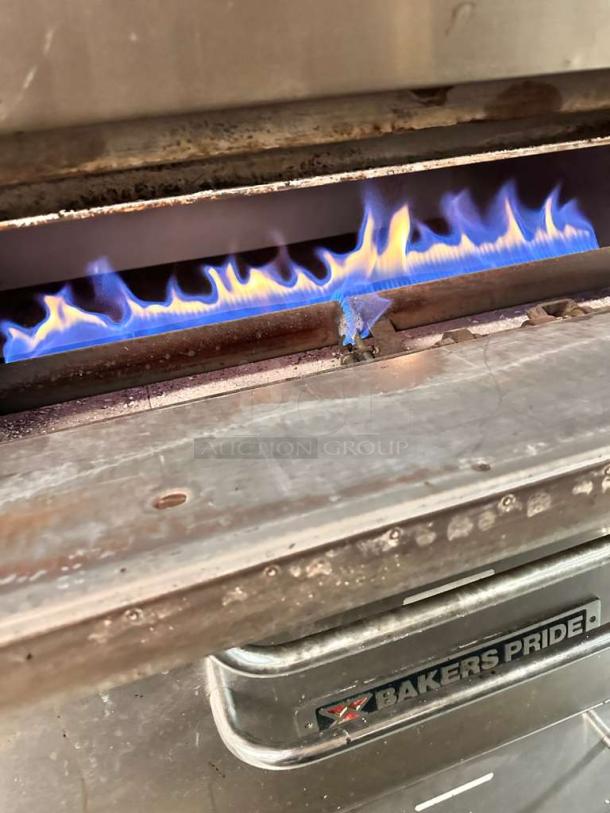 Bakers Pride 151 Super Deck pizza oven, natural gas, flame visible, labeled, outstanding condition.