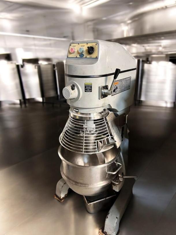 Globe SP40P 40-Qt mixer, superb condition, 220V. Features include control panel, safety cage, and markings, fully tested.