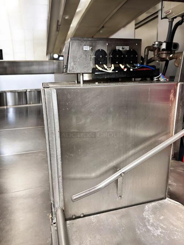 Ecolab/Hobart ES-2000 commercial conveyor dishmachine in excellent condition. Stainless steel, fully tested and working.