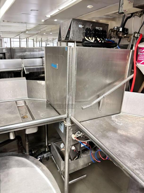 Ecolab/Hobart ES-2000 commercial conveyor dishmachine in excellent condition; fully tested and functional, stainless steel.