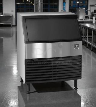 Manitowoc Q210 commercial undercounter ice machine in pristine condition, dice cube ice type, stainless steel exterior, fully tested.