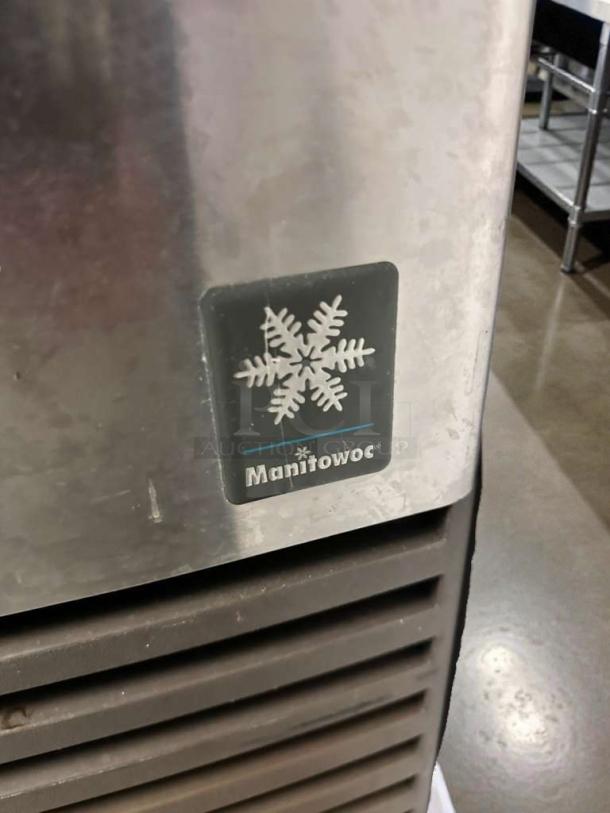 Pristine Manitowoc Q210 undercounter ice machine, dice cube ice, fully tested, snowflake logo, durable stainless steel.