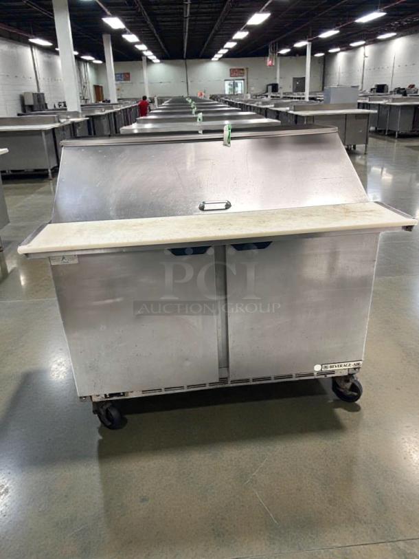 Beverage-Air SPE48HC-18M refrigerated prep table, immaculate condition, fully tested, stainless steel, 115V, on casters.