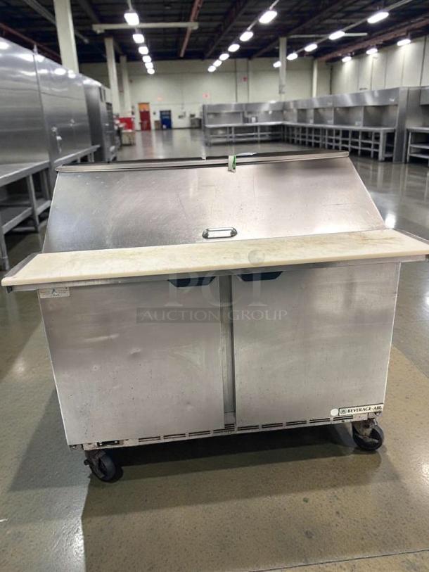 Beverage-Air SPE48HC-18M refrigerated prep table, stainless steel, dual doors, immaculate condition, 115V, commercial use.