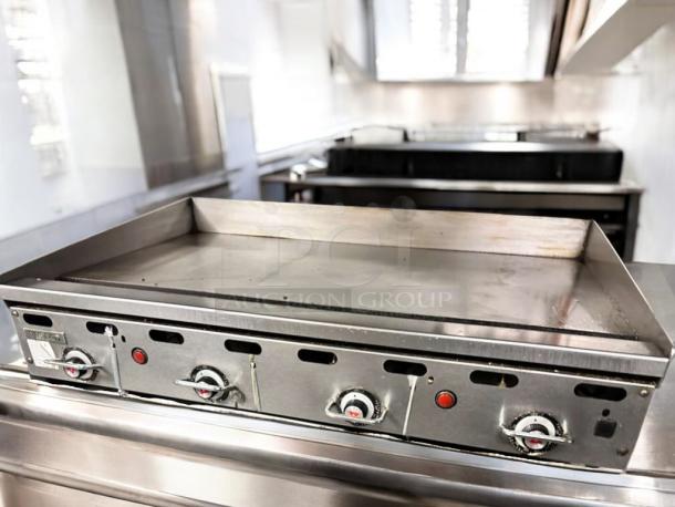 Outstanding condition Vulcan gas flat top griddle, natural gas, tested, heavy-duty, with control knobs and stainless steel finish.