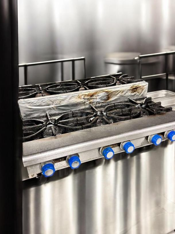 Imperial IHPA-8-48SU 48" commercial gas hotplate, 8 burners, excellent condition, fully tested, natural gas compatible.