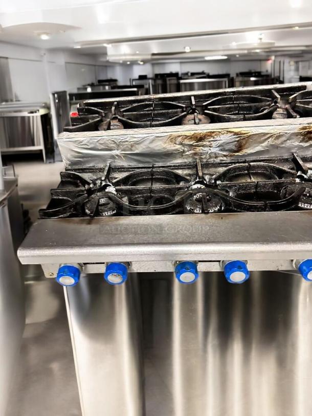 Imperial IHPA-8-48SU 48" commercial gas hotplate, 8 burners, natural gas, step-up design, fully tested and working.