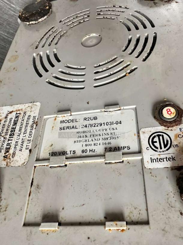ETL labels and model info on Robot Coupe R2 Ultra food processor. Tags show 120V, 60Hz, 7.2 Amps, fully tested.