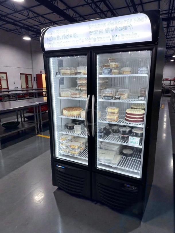 Minus Forty Dual Glass Door Display Refrigerator, Model 43-UDGF-X1, in superb condition. LED-lit with 8 shelves.