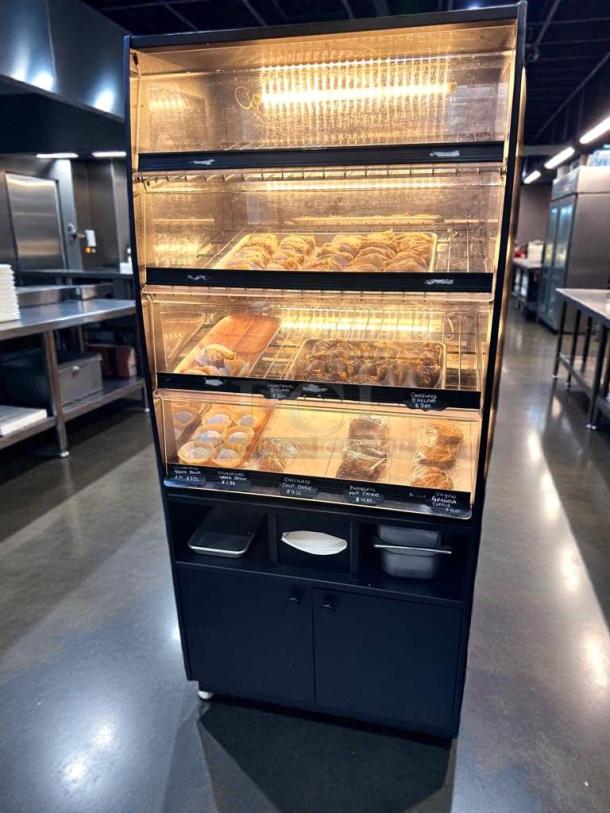 Minus Forty BK-8 Shelf Refrigerated Bakery Display Case, outstanding condition, fully tested, with labeled multi-shelves.
