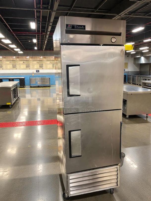Pristine True T-23-2 commercial reach-in refrigerator, stainless steel, dual doors, 115V, excellent condition, fully tested.