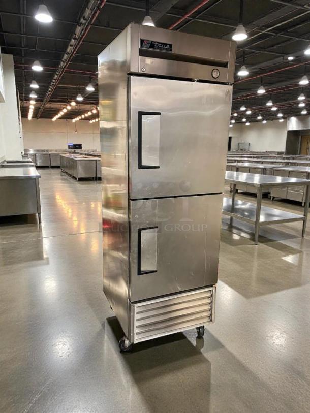 Pristine True T-23-2 commercial reach-in refrigerator, stainless steel, dual doors, 115V, fully tested and working.