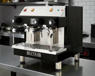 Astra MEGA II semi-automatic espresso machine in great condition, tested and working, black and stainless steel finish, 220V.