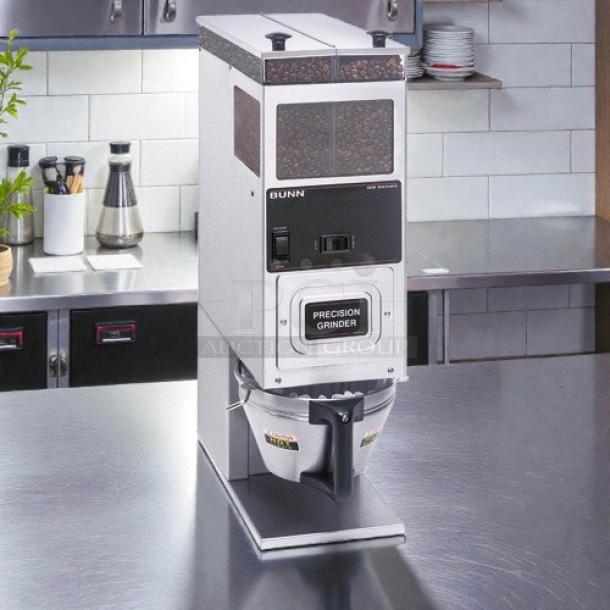 BUNN G9-2T coffee grinder in great condition, tested and working, with precision control, model 24250.0021, on a stainless steel counter.