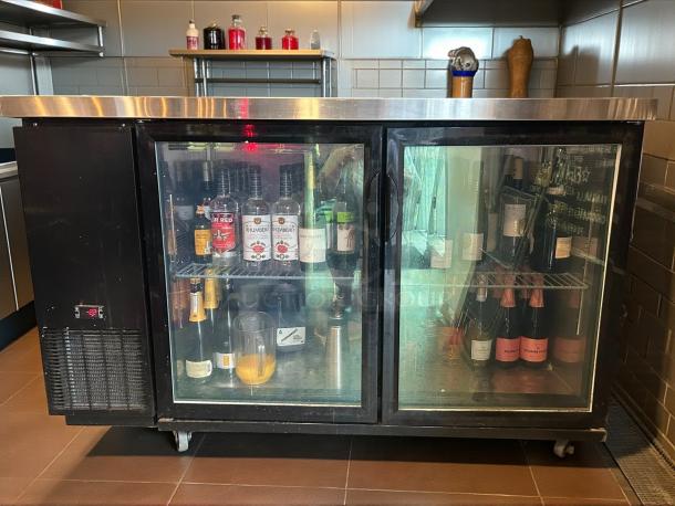 Migali BB60-N12 60" back bar refrigerator, like new condition, dual glass doors, stainless steel top, tested and working.