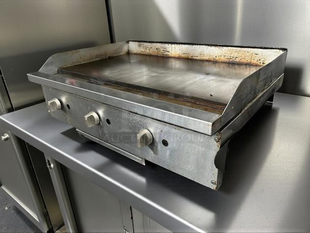 American Range ARSMG-36 36" countertop gas griddle in great condition, tested and working, with visible control knobs.