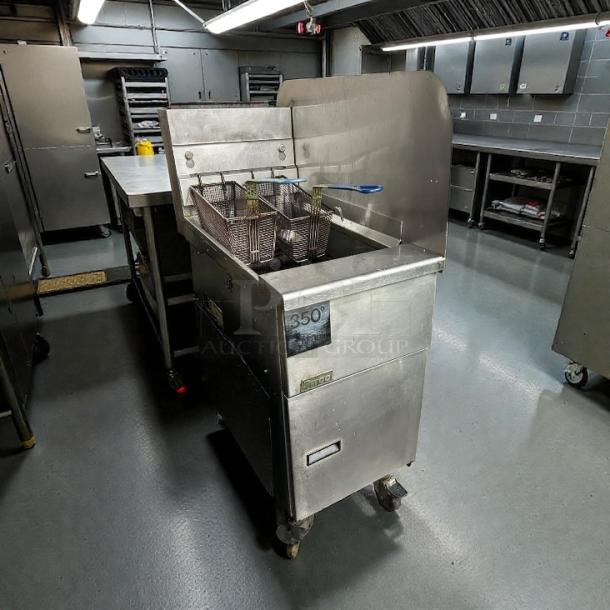 Pitco SG14-S stainless steel floor fryer, natural gas, 40-50 lb capacity, 110,000 BTU, excellent condition, tested and working.