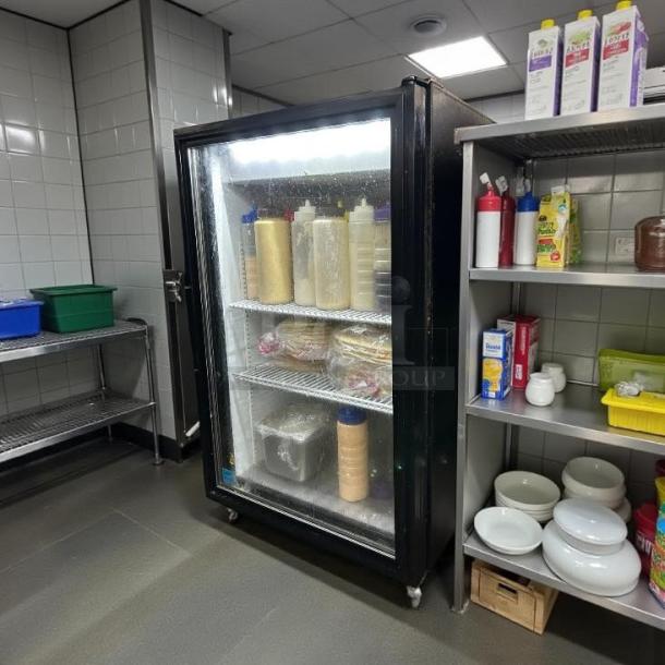 True GDM-07 black refrigerated glass door countertop merchandiser, 24 1/8", excellent condition, tested and working.