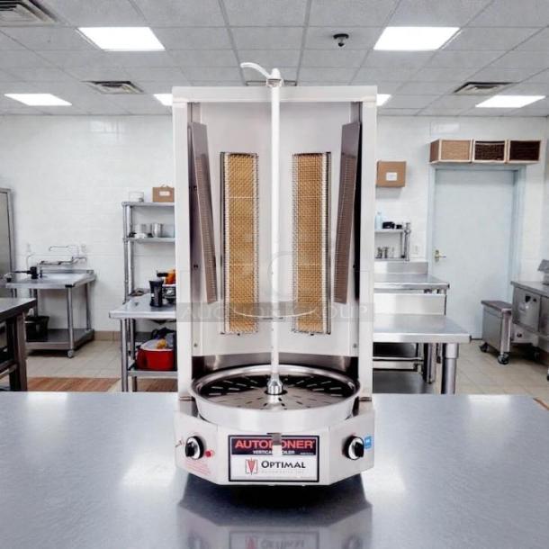 Auto Doner 3PG vertical broiler in great condition, natural gas, 65 lb. capacity, tested, working, labels show model.