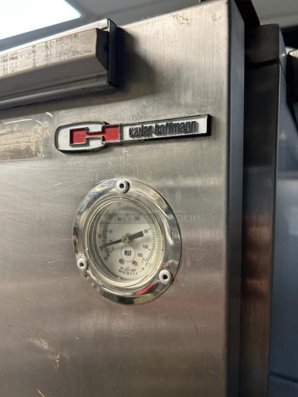 Carter-Hoffmann PH1800 mobile insulated heated transport cabinet with temperature gauge, logo, and NSF label, in excellent condition.