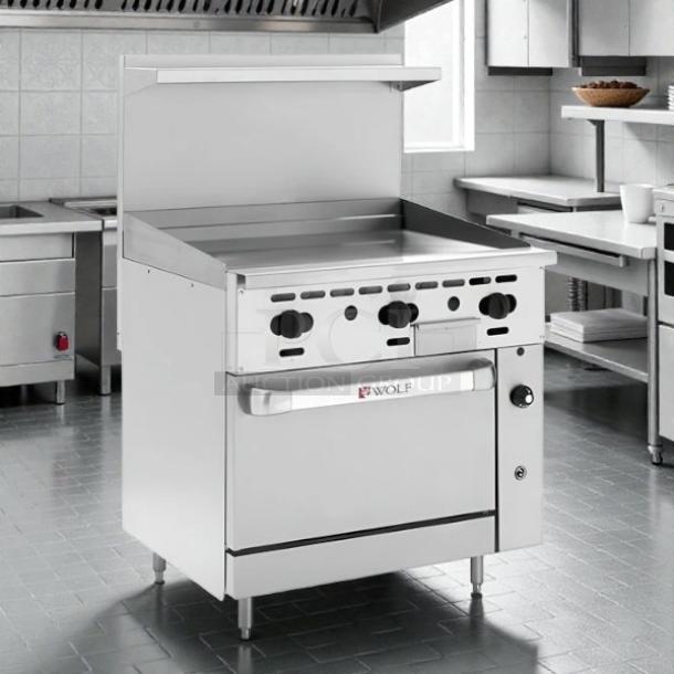 Wolf C36S-36G 36" Gas Range with full griddle and standard oven, tested and working, in stainless steel, excellent condition.