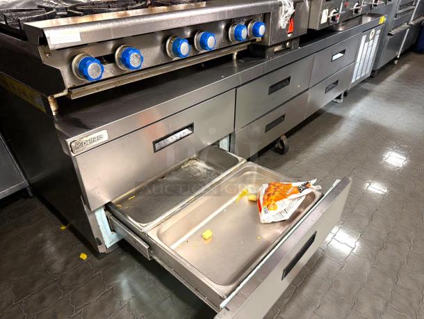 Delfield F2996CP 96" Refrigerated Chef Base with 6 drawers, tested and working, featuring robust steel construction.