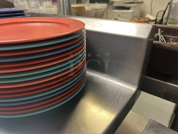 GSW 48" x 30" work table with stainless steel top and 1-1/2" rear upturn, sturdy condition, ideal for kitchen use.