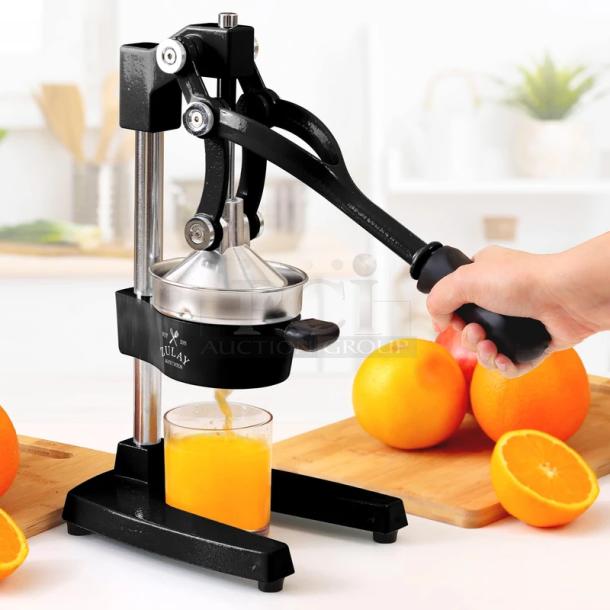 Zulay Kitchen Cast-Iron orange juice squeezer in heavy-duty condition, shown in use. Durable design with ergonomic handle.