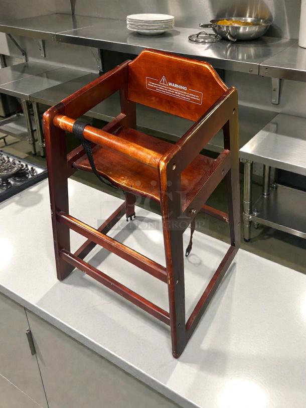 Modesto Brown Finish Wood High Chair, sturdy, excellent condition, safety strap, warning label on backrest, Model: Brown.