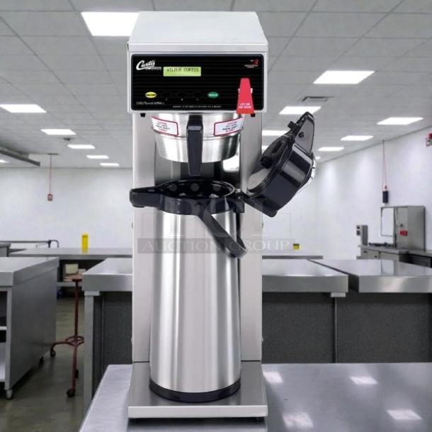 Curtis D500GT63A000 Automatic Airpot Coffee Brewer, digital controls, 120/220V, excellent condition, tested and working.