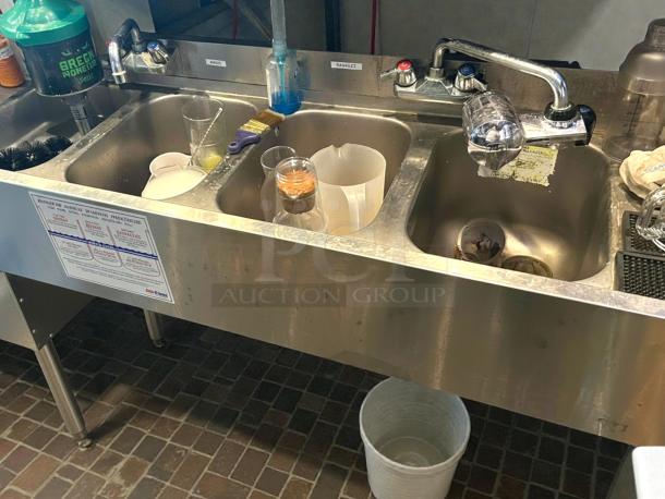 Krowne 18-84C underbar sink with four compartments, two 24" drainboards, and dual faucets, in great condition.