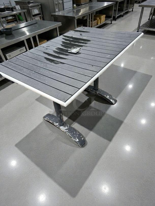 Set of four commercial patio tables in outstanding condition. Weather-resistant, fully inspected, ready to use.