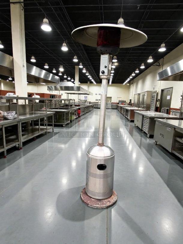 Stainless steel commercial patio heater with mushroom top in superior condition, tested and ready to use. Quantity: 4.