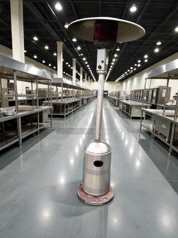 Stainless steel mushroom-top outdoor patio heater in superior condition, commercial grade, tested and ready to use.