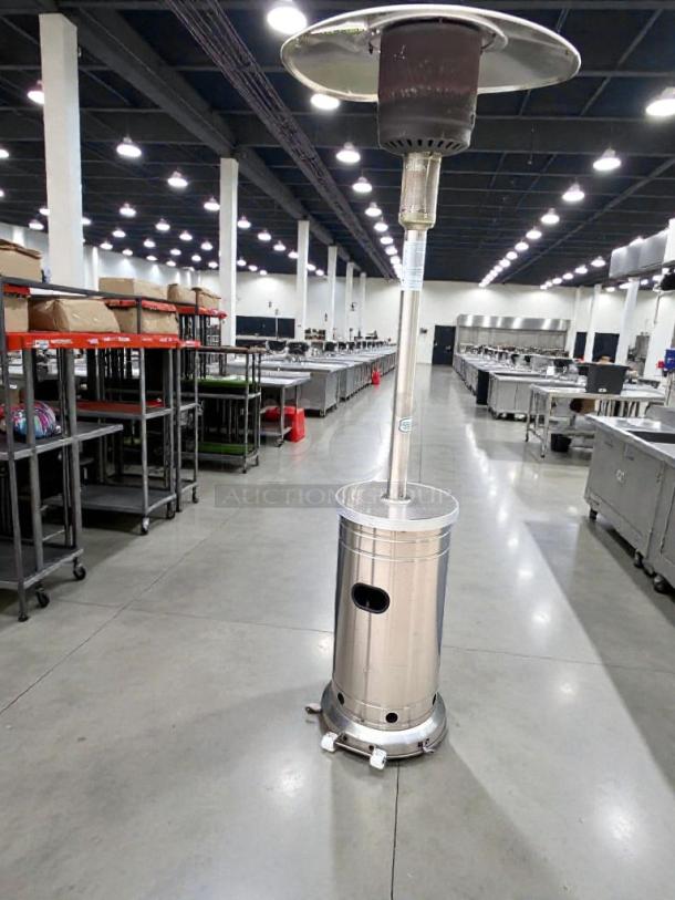 Stainless steel mushroom-top patio heater in superior condition, commercial grade, tested, and ready to use.