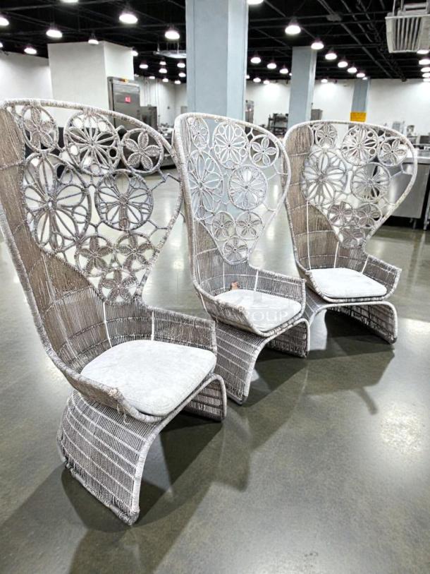 Set of 3 designer wicker lounge chairs, high-back, pristine condition, inspected, ready for outdoor use, intricate woven design.
