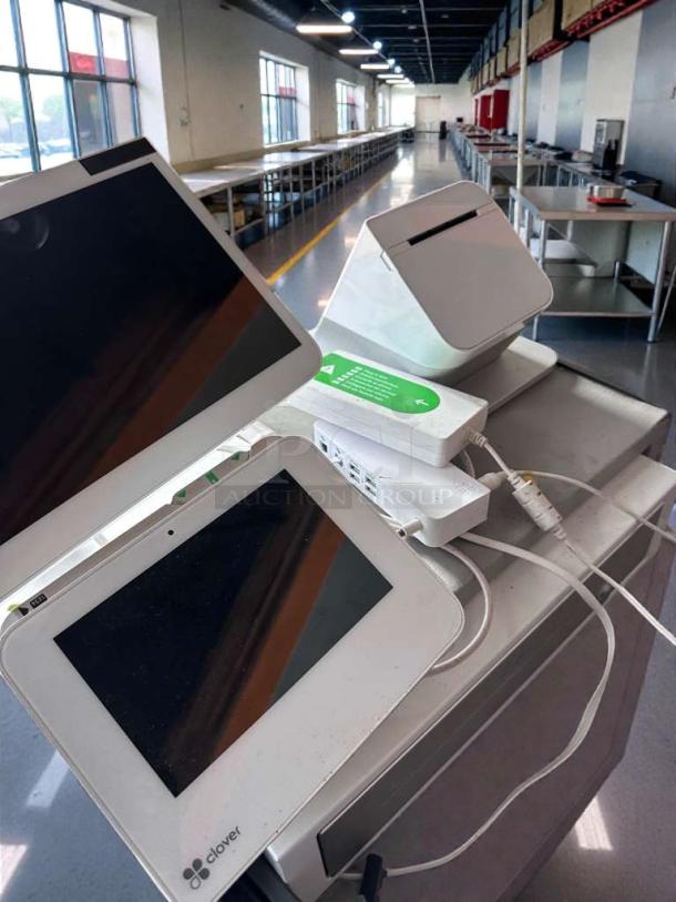 Clover Station POS system in pristine condition, 120V, fully tested, includes display, printer, and cables.