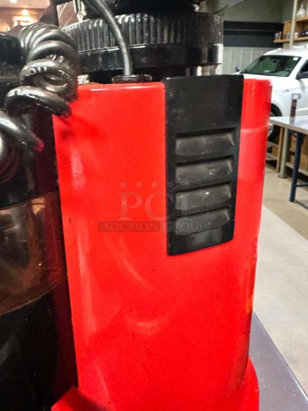 Red commercial coffee grinder in premium condition, 120V, fully tested and working, featuring a sturdy black control panel.